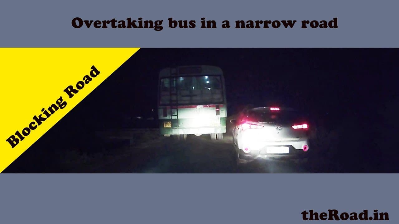 Bus driver blocking overtaking in a narrow road