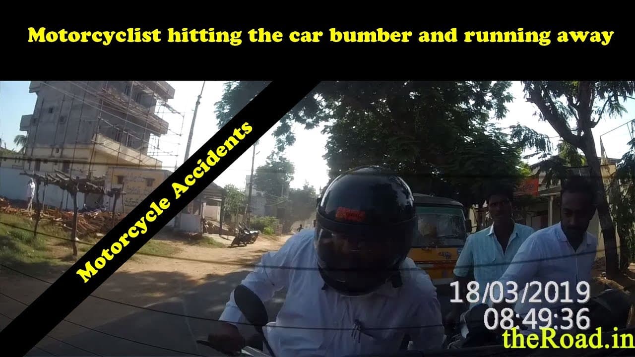Motorcyclist hitting the car bumber and running away | Careless driving