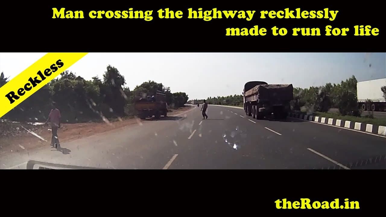 Run Baby Run | Man recklessy crossing the higway made to run